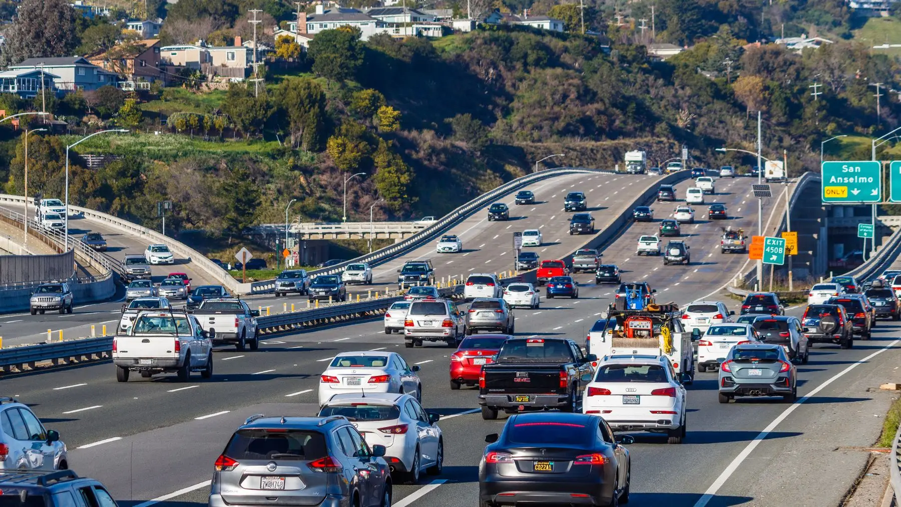 Dense highway traffic with most cars carrying a single occupant, the problem carpooling is meant to solve